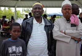 Ali H., Ismail Hussein and Ahmed Abdi Awol at a World Refugee Day event at Mountain View Lions Park, June 19.